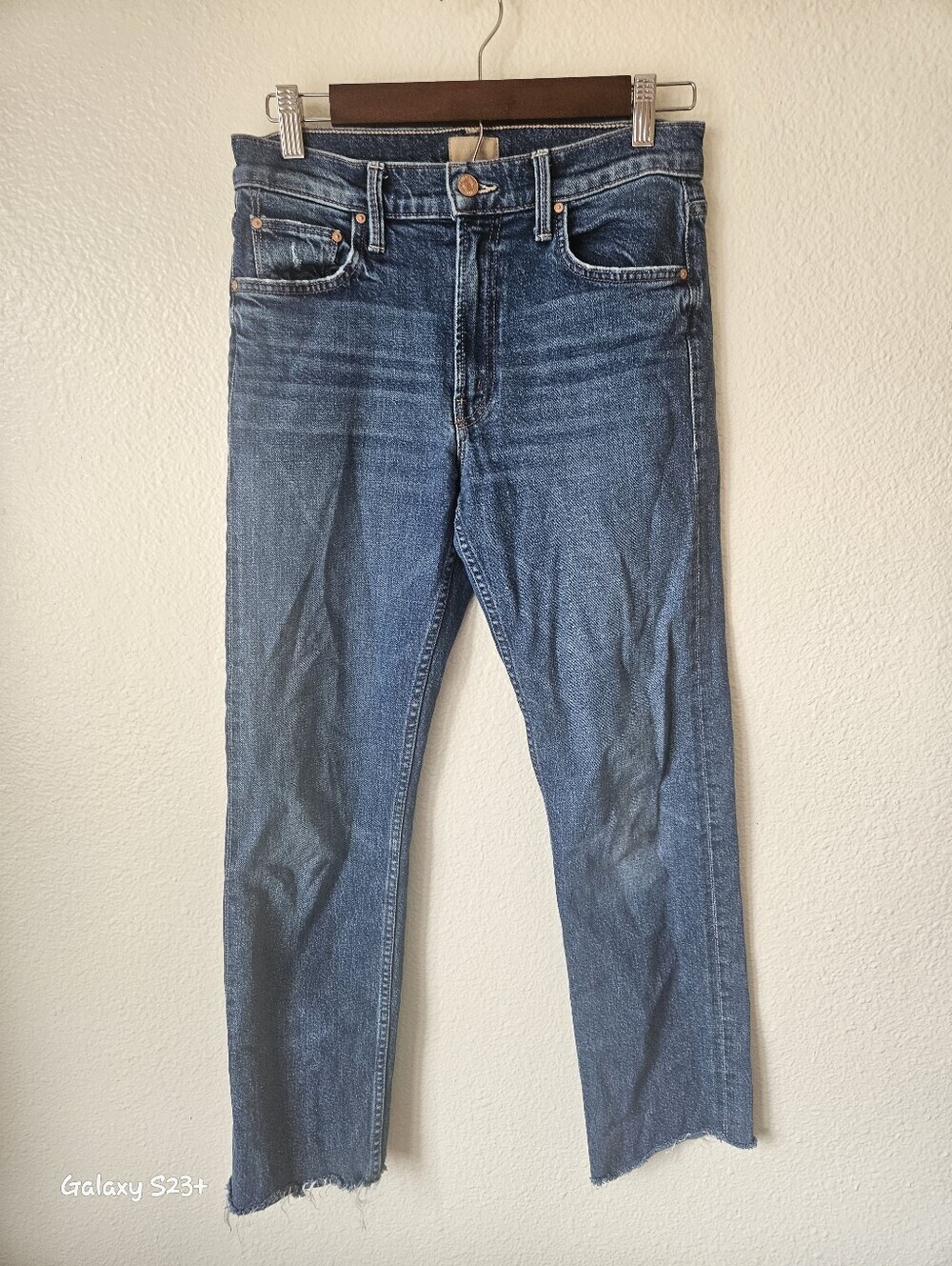MOTHER- The Mid Rise Rider Ankle Fray in the Local Charm wash is a mid-blue, 27
